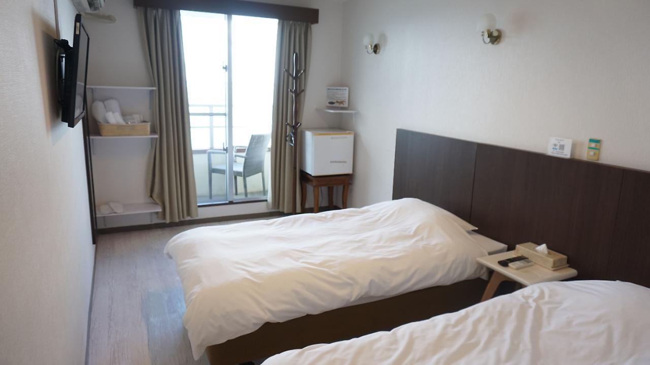 Hotel Oceans Nakijin Bagian luar foto